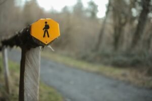 slippery when wet road sign